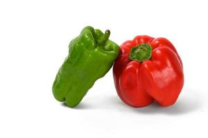 Green and red peppers white background photo