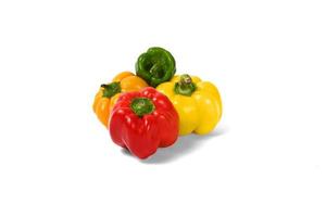 yellow and red peppers white background photo