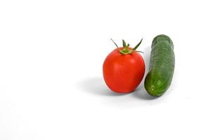 tomato and cucumber isolated on white background photo