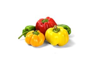 yellow and red peppers white background photo