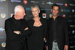 LOS ANGELES, OCT 30 - Malcolm McDowell, Jamie Lee Curtis, Malek Akkad at the sCare Foundation Halloween Launch Benefit at Conga Room  LA Live on October 30, 2011 in Los Angeles, CA photo