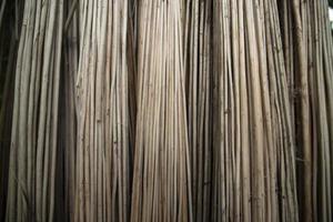 Rows and Rows of brown Jute Sticks Texture background of a field photo