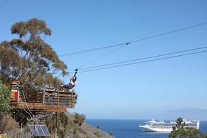 LOS ANGELES, APR 26 - Ziplining on Catalina Island at Catalina Film Festival on August 26, 2014 in Avalon, Catalina Island, CA photo