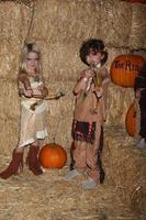 LOS ANGELES, OCT 4 - McKenna Grace, August Maturo at the RISE of the Jack O Lanterns at Descanso Gardens on October 4, 2014 in La Canada Flintridge, CA photo