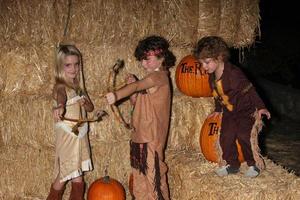 LOS ANGELES, OCT 4 - McKenna Grace, August Maturo, Ocean Maturo at the RISE of the Jack O Lanterns at Descanso Gardens on October 4, 2014 in La Canada Flintridge, CA photo