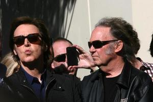 LOS ANGELES, FEB 9 - Paul McCartney, Neil Young at the Hollywood Walk of Fame Ceremony for Paul McCartney at Capital Records Building on February 9, 2012 in Los Angeles, CA photo