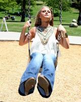 LOS ANGELES, AUG 1 - Savannah Outen playing in the park, wearing Wallflower jeans at Midtown LA on August 1, 2011 in Los Angeles, CA photo