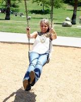 LOS ANGELES, AUG 1 - Savannah Outen playing in the park, wearing Wallflower jeans at Midtown LA on August 1, 2011 in Los Angeles, CA photo