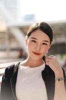 Portrait of young adult beautiful asian business working woman on day. photo