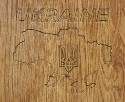 map of ukraine on a wooden board photo