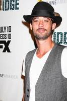 LOS ANGELES, JUL 8 - Ryan Bingham arrives at The Bridge FX Network Premiere Screening at the Directors Guild of America on July 8, 2013 in Los Angeles, CA photo