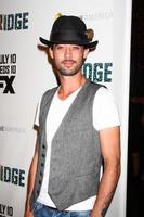 LOS ANGELES, JUL 8 - Ryan Bingham arrives at The Bridge FX Network Premiere Screening at the Directors Guild of America on July 8, 2013 in Los Angeles, CA photo