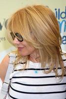 LOS ANGELES, JUN 14 - Rosanna Arquette at the Children Mending Hearts 6th Annual Fundraiser at Private Estate on June 14, 2014 in Beverly Hills, CA photo