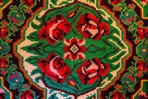 Romanian folk seamless pattern ornaments. Romanian traditional embroidery. Ethnic texture design. Traditional carpet design. Carpet ornaments. Rustic carpet design photo