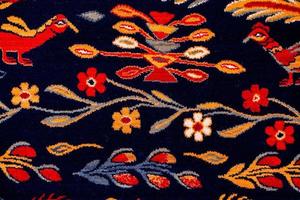 Romanian folk seamless pattern ornaments. Romanian traditional embroidery. Ethnic texture design. Traditional carpet design. Carpet ornaments. Rustic carpet design photo