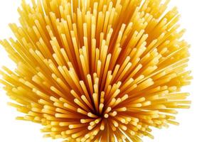 The bundle of spaghetti is isolated on a white background. a top view. photo