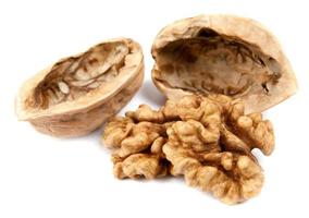 The core and shells of walnut are isolated on a white background. photo