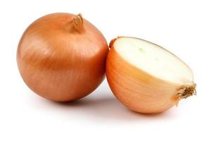 Whole and half bulb of golden onion are isolated on a white background. photo