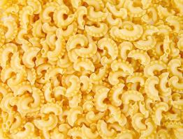 Pasta background. The pasta is filled with an even layer. photo