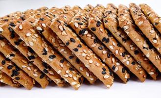 A stack of cookies with black and white sesame. photo