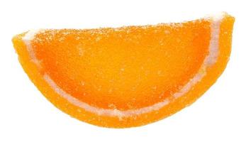 A slice of orange from marmalade is isolated on a white background. photo