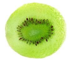 The dried kiwi slice is isolated on a white background. photo
