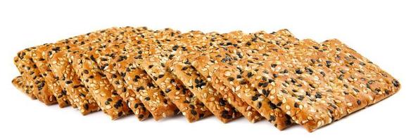 A stack of cookies with black and white sesame is isolated on a white background. photo