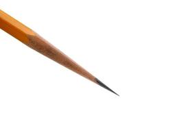 an acutely honed pencil on a white background. photo