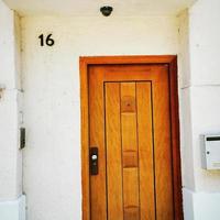 MISKOLC,HUNGARY-06.13.2020. A close up of a brown door photo