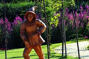 MISKOLC,HUNGARY-07.27.2020. A statue that is standing in the grass photo