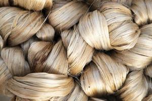 thick brown bundle of raw jute fiber Texture Background photo