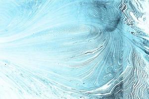 blue swirls marble texture with natural pattern for design art background photo