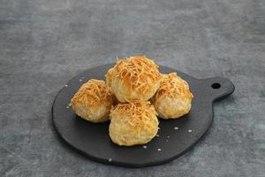 Pia Crispy with cheese filling, pastry with layered smooth skin texture, sweet and savory photo