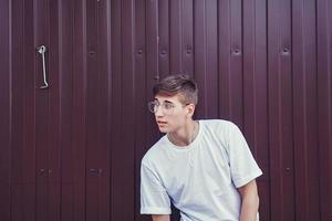 young man wearing glasses photo