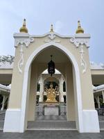 Phra Brahma gold color Thai temples sacred things beliefs Buddha photo