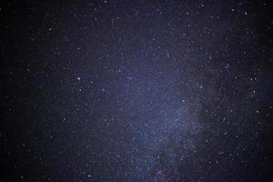 milky way galaxy and space dust in the universe, Long exposure photograph, with grain. photo