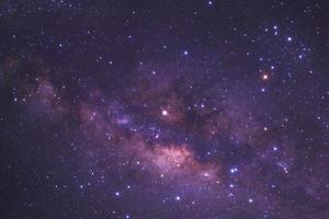 Milky way galaxy with stars and space dust in the universe, Long exposure photograph, with grain. photo