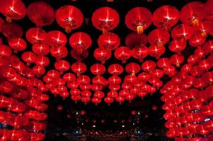 Chinese red lanterns hang for decorate photo