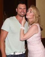 LOS ANGELES, AUG 26 - Joshua Morrow, Michelle Stafford attending the Young and Restless Fan Dinner 2011 at the Universal Sheraton Hotel on August 26, 2011 in Los Angeles, CA photo