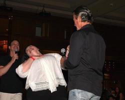 LOS ANGELES, AUG 26 - Eric Braeden, Girl from Audience Who Won attending the Young and Restless Fan Dinner 2011 at the Universal Sheraton Hotel on August 26, 2011 in Los Angeles, CA photo