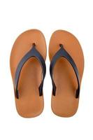 Brown rubber flip flops on a white background