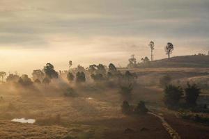 Misty morning sunrise in Khao Takhian Ngo View Point at Khao-kho Phetchabun,Thailand photo