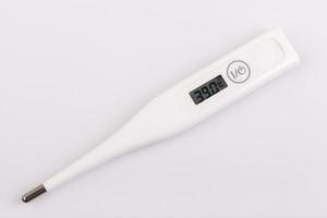 Thermometer on white background photo