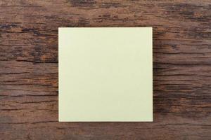 Blank empty note paper on wood table photo