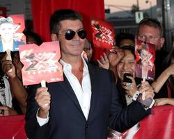 LOS ANGELES, SEP 14 - Simon Cowell arriving at the X-Factor Premiere Screening at ArcLight Theater on September 14, 2011 in Los Angeles, CA photo