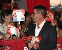 LOS ANGELES, SEP 14 - Simon Cowell arriving at the X-Factor Premiere Screening at ArcLight Theater on September 14, 2011 in Los Angeles, CA photo