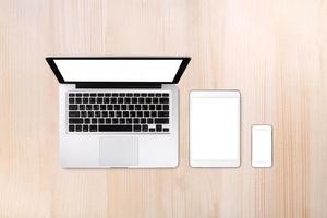 Laptop tablet and smartphone on white background with text space and copy space photo
