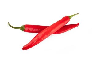 red chili or chilli cayenne pepper isolated on white background photo