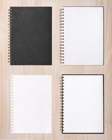 Blank notebook or notepad with line paper on wood background photo