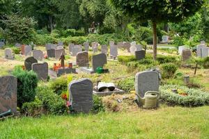 gravestones in a cemetery photo